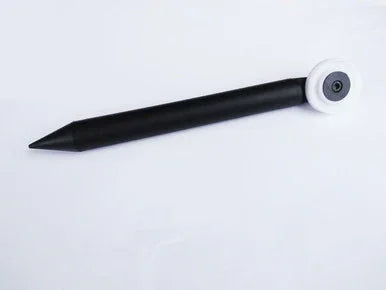 black stylus pen with white circular tip on white background